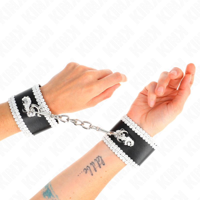 Schwarze Handballenauflage mit weißer Spitzenverzierung verstellbar 20-23 cm x 5,5 cm